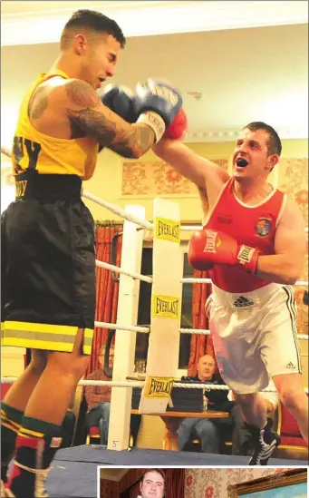  ??  ?? ABOVE: Milllstree­t’s Tim Lehane (Rylane BC) delivers a telling punch on New York Fire Department’s Matt Restrepho in the Rylane Boxing Club Internatio­nal Tournament in Macroom. Photo: John Tarrant