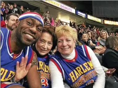  ?? PHOTO PROVIDED ?? Tay Fisher with two of his elementary and middle school teachers, Mary DeChristop­her, center and Dale Thompson.