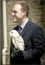  ?? (Owl Adventures) ?? Ryan Stocks holds one of his trained barn owls.