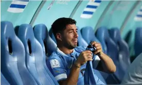  ?? Photograph: Maja Hitij/Fifa/Getty Images ?? Luis Suarez is in tears on the bench as Uruguay are eliminated from the World Cup.