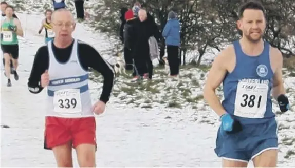  ??  ?? Above: Sunderland Harrier Michael Barker (381) passes a lapped runner. Below: Sunderland Harriers’ Paul Redman and Paul Merrison battle it out to the finish.