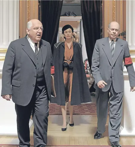  ??  ?? Simon Russell Beale as Lavrentiy Beria, Olga Kurylenko as Maria Yudina and Steve Buscemi as Nikita Khrushchev.