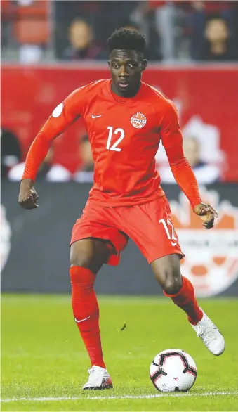  ?? VAUGHN RIDLEY/GETTY IMAGES ?? Alphonso Davies, seen in action against the U.S. on Tuesday night in Toronto, could combine with Jonathan David to give Canada a potent one-two striking punch over the next decade.