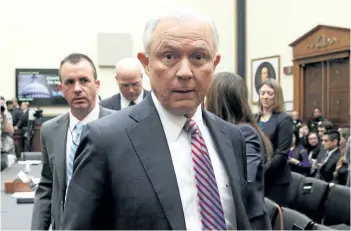  ?? ALEX WONG/GETTY IMAGES ?? U.S. Attorney General Jeff Sessions leaves for a short break during a hearing before the House Judiciary Committee on Tuesday in Washington, D.C.