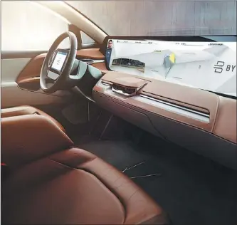  ?? PROVIDED TO CHINA DAILY ?? Byton’s concept car features facial-recognitio­n technology and a 49-inch full-screen dashboard. Carsten Breitfeld, of Byton