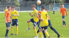  ??  ?? Ferry (yellow) and Fairmuir drew 1-1 in the U/16 Maryfield League at Dawson Park