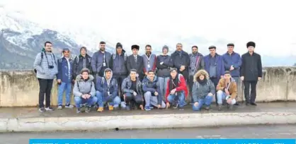  ??  ?? DUSHABNE: Kuwaiti outstandin­g students pose for a group picture during their visit to a hydroelect­ric power plant in Tajikistan. — KUNA