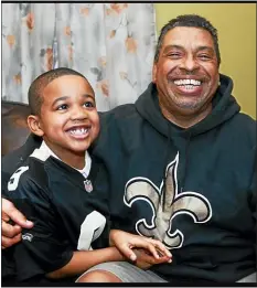  ?? MEDIANEWS GROUP FILE PHOTO ?? Kyle Davis, right, and the grandson he was raising as his own, Ny’Ques Farlow-Davis, share a happy moment in this Delaware County Daily Times shot from 2014.