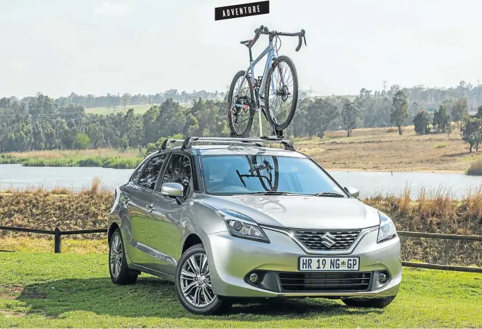  ?? Pictures: Waldo Swiegers ?? The Suzuki Baleno tester replete with a roof rack and Momsen bicycle.