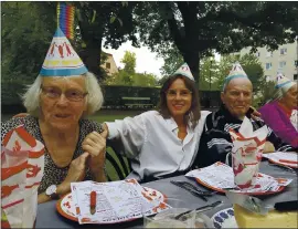  ?? COURTESY OF MIA GRANE VIA THE NEW YORK TIMES ?? Mia Grane is seen with her parents, both of whom died in a nursing home. The nursing home is operated by Sweden’s largest for-profit operator of the facilities.