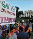  ??  ?? Anti-trans ban protesters in front of the White House in Washington back in July