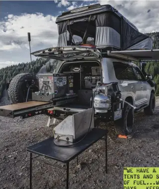  ??  ?? The Land Cruiser’s Trekboxx Alpha storage system securely holds plenty of gear including a National
Luna 60L 2-in-1 Fridge/Freezer and Partner Steel 2 burner
24-inch stove.