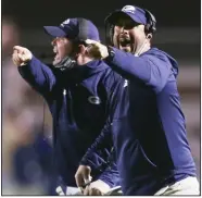  ?? (NWA Democrat-Gazette/Charlie Kaijo) ?? Chris Young (right) led Greenwood to its 10th state championsh­ip in his first season as the Bulldogs’ head coach last year. Greenwood graduated several key players from last year’s team, but it opens the season as the No. 1 team in Class 6A.