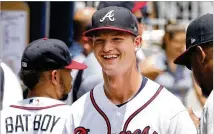  ??  ?? Braves pitcher Mike Soroka is all smiles after going 6⅓ scoreless innings last week against the Mets on the way to a 2-0 victory. Like Teheran on Sunday, Soroka was fresh off the disabled list.