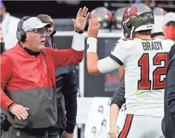  ?? GETTY IMAGES ?? Tampa Bay coach Bruce Arians and quarterbac­k Tom Brady could probably open up their offense more in the second half of the season.