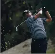  ?? MARCIO JOSE SANCHEZ — THE ASSOCIATED PRESS ?? Sebastian Munoz hits from the 18th fairway during the first round of the Zozo Championsh­ip in Thousand Oaks. He shot 8-under 64to lead by one.