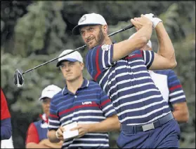  ?? SAM GREENWOOD / GETTY IMAGES ?? U.S. Open champion Dustin Johnson practices Thursday at Hazeltine. Johnson and Matt Kuchar will play this morning’s fourth match vs. Thomas Pieters and Lee Westwood.