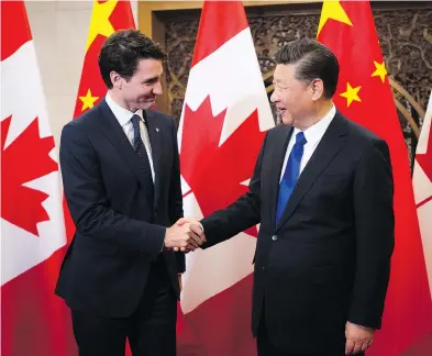  ?? SEAN KILPATRICK / THE CANADIAN PRESS ?? Prime Minister Justin Trudeau with Chinese President Xi Jinping at Diaoyutai State Guesthouse in Beijing Tuesday.