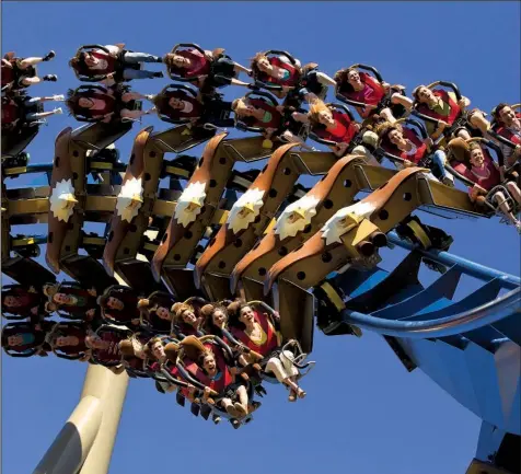  ?? Pigeon Forge Department of Tourism ?? The Wild Eagle, perched 21 stories above Dollywood, is America’s first “wing coaster,” where riders have nothing but air above and below. Dollywood, which reopened for the season last month, sustained no damage during November’s wildfires that ravaged...