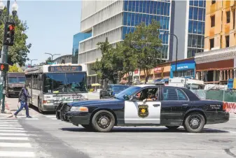  ?? Gabrielle Lurie / The Chronicle ?? Traffic enforcemen­t has long been a police job, but Berkeley officials are considerin­g a new approach as they reevaluate officers’ duties in the wake of uprisings over police brutality.