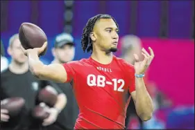  ?? Michael Conroy The Associated Press ?? The Raiders likely will have to trade up to select Ohio State QB CJ Stroud, but they also are prepared to deal down in the draft.