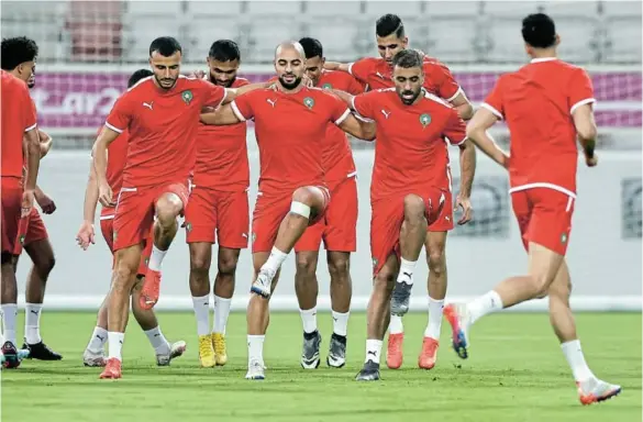  ?? /THAIER AL-SUDANI/REUTERS ?? The Morocco squad, with Romain Saiss, Sofyan Amrabat and Abderrazak Hamdallah at the front, appear calm at training as they prepare for key Group F tussle against Canada. Morocco need just a draw to advance to the next round.