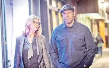  ?? — Photo by Glen Wilson, Sony Pictures Entertainm­ent ?? Melissa Leo, left, and Denzel Washington in “The Equalizer 2.”