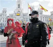  ?? Oscar del Pozo / AFP via Getty Images ?? Protests abound in Madrid for COP25, the annual U.N. conference for world leaders to assess the fight against climate change.