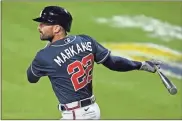  ?? AP-aP — Terrance Williams, file ?? Nick Markakis watches his double during the second inning of the a game against the Orioles last season in Baltimore. The 37-year-old Markakis announced his retirement Friday, ending a 15-year major league career