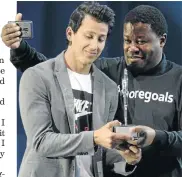  ?? /LEFTY SHIVAMBU/GALLO IMAGES ?? Amr Gamal, left, accepts Player of the Tournament award for Telkom Knockout.