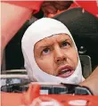  ?? FOTO: DPA ?? Sebastian Vettel im Cockpit seines Ferraris.