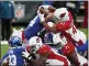  ?? NOAH K. MURRAY — THE ASSOCIATED PRESS ?? Arizona Cardinals’ Kenyan Drake (41), top right, leaps over New York Giants defenders to score a touchdown during the second half of an NFL football game, Sunday, Dec. 13, 2020, in East Rutherford, N.J.