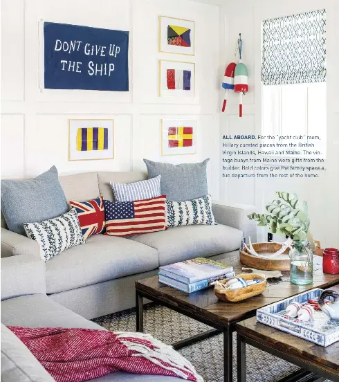  ?? ?? ALL ABOARD. For the “yacht club” room, Hillary curated pieces from the British Virgin Islands, Hawaii and Maine. The vintage buoys from Maine were gifts from the builder. Bold colors give the family space a fun departure from the rest of the home.
