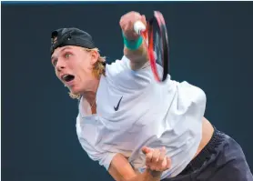  ?? CP PHOTO ?? Denis Shapovalov serves to Robin Haase during their Thursday match at the Rogers Cup in Toronto.