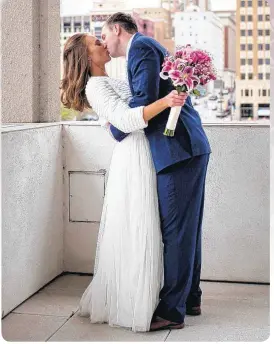  ?? [PHOTO BY MELENA WRIGHT PHOTOGRAPH­Y, FOR THE OKLAHOMAN] ?? Lauryn Schack and Luke Balke wed on April 14 at the Tulsa City County Central Library in Tulsa.