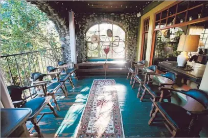  ?? Photog raphs by Francine Orr Los Angeles Times ?? HILLARY DANNER’S Highland Park home has a porch lined with chairs that were props in “The Goonies.”