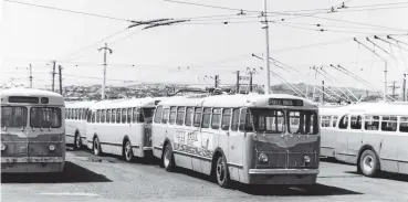 ??  ?? Remember these? A lineup of trolley buses in the 1960s at Dunedin City Transport’s McBride St depot. We’ve been sent the photo (taken by David Jones), by Allan Steel, who is seeking other photograph­s of the city’s 79 trolley buses which operated...