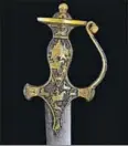  ?? CREDIT: TOOR COLLECTION ?? Maharaja Ranjit Singh on a Sikh sword. The guard of the hilt, which shows the Sikh king riding an elephant, is inscribed with the tenth Sikh Guru’s philosophy on the nature of kingship: ‘May the cauldron and sword flourish in the world. Grant your...