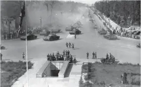  ??  ?? ▲ Парад Победы союзных войск 7 сентября 1945 года в Берлине. колонна советских танков иС-3