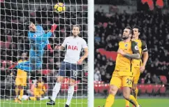  ??  ?? Fluke: Mathew Ryan watches as Serge Aurier’s strike sails by