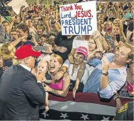  ?? Picture: AFP PHOTO ?? GREAT WHITE HOPE: Republican presidenti­al hopeful Donald Trump greets supporters after a rally at a stadium in Mobile, Alabama, in August last year