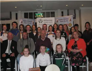  ??  ?? Launch of East Kerry Scór; Seated: Johnny Brosnan Chairman, Jack Hennessy PRO County Board Scór, Christy Kileen County Board Cultural Officer/Scór, Amy Reidy Scór Officer, Helen Courtney Sponsor Killarney Credit Union Also included young club musicians, singers and dancers from Fossa, Glenflesk, Gneeveguil­la, Kilcummin and Killarney Legion GAA clubs.