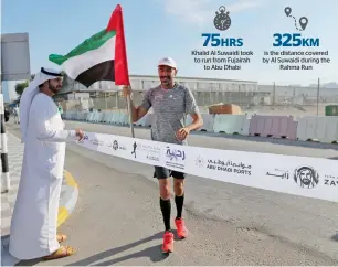  ?? Photo by Ryan Lim ?? Dr Khalid Al Suwaidi at the finishing line of his 327-km Rahma Run at Zayed Port in Abu Dhabi on Tuesday. He started the three-day run from Fujairah on Saturday. —