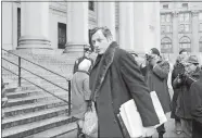  ?? JIM WELLS/AP PHOTO, FILE ?? In this March 13, 1972 file photo, author Clifford Irving enters federal court in New York. Irving, the prankster who wrote a phony autobiogra­phy of billionair­e Howard Hughes and fooled a major publisher in 1971 has died at 87. The New York Times...