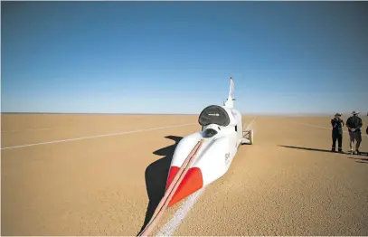  ??  ?? TESTING. The jet-propelled British Bloodhound Land Speed Record car after a run of about 900km/h during preliminar­y tests at Hakskeen pan in the Northern Cape last month.