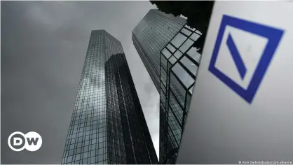  ?? ?? Deutsche Bank's headquarte­rs saw fresh raids over allegation­s the bank waited years to flag a suspicious transactio­n