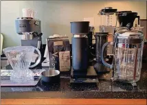  ?? TIM CARMAN/WASHINGTON POST ?? The author tested a single coffee on five brewing devices: an AeroPress, Chemex, Stagg X pour-over dripper, Clever dripper and French press.