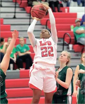  ??  ?? Senior Jazzmyn Elston went over 1,000 points for her high school career during Friday’s victory over North Murray. (Catoosa County News photo/Scott Herpst) LFO girls 43, Murray County 40