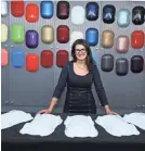  ??  ?? Nancy Lockhart of Axalta Coating Systems, an automotive paint supplier, says paint companies are working to make dark colors more reflective. AXALTA COATING SYSTEMS