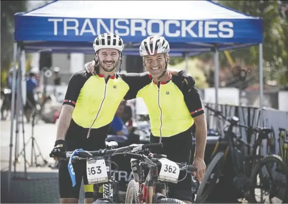  ??  ?? A.J. Stieda, 25, left, and his father Alex Stieda, 58, a former stage winner at the Tour de France, competed in last year’s mountain bike race in
Golden, B.C.